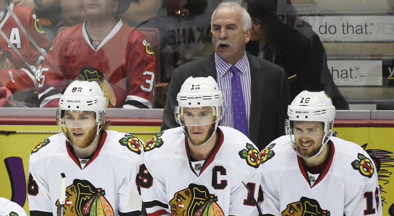 Blackhawks coach Joel Quenneville with, from left to right, Patrick Kane, Jonathan Toews and Marcus Kruger. Blackhawks coach Joel Quenneville with, from left to right, Patrick Kane, Jonathan Toews and Marcus Kruger.