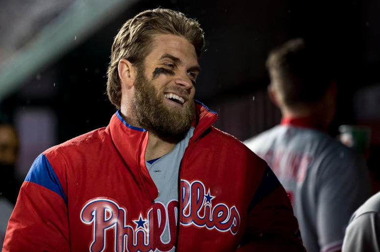 Bryce Harper Bryce Harper #3 of the Philadelphia Phillies reacts in the dugout after Maikel Franco hit a home run in the second inning against the Washington Nationals at Nationals Park on April 2, 2019 in Washington, DC.