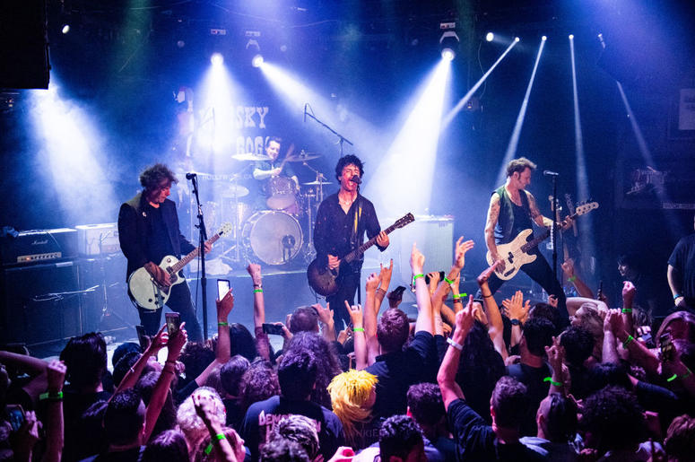 Green Day Jason White, Tré Cool, Billie Joe Armstrong and Mike Dirnt of Green Day perform during the “Hella Mega Tour” announcement show at Whisky a Go Go