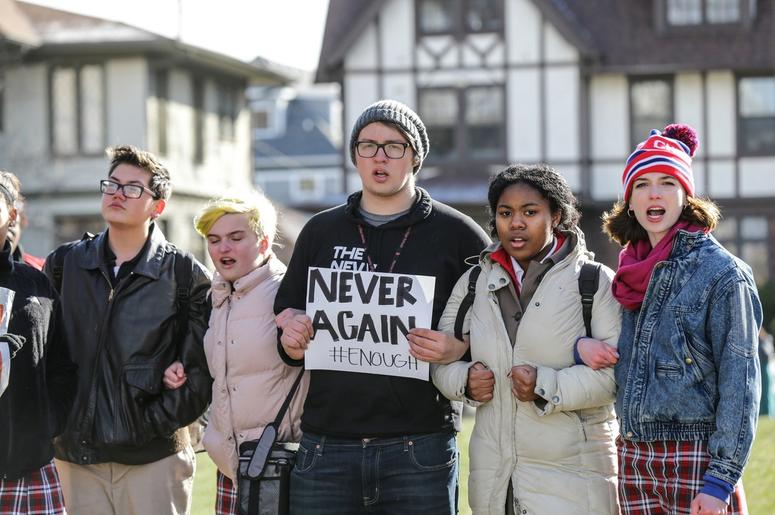 March 14, 2018; Indianapolis, IN, USA; Students at Herron High School in Indianapolis link arms and chant while taking part in the National School Walkout . Photo Credit: Michelle Pemberton/Indianapolis Star via USA Today Network
