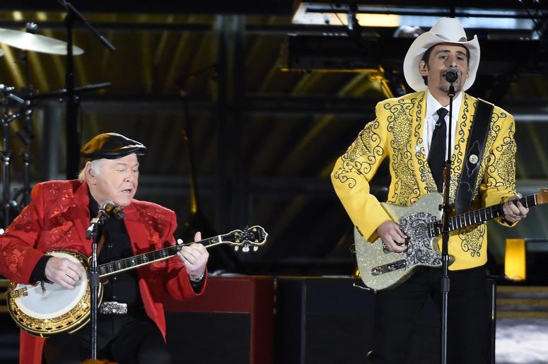Roy Clark and Brad Paisley perform during the 50th Country Music Association Awards at Bridgestone Arena. Roy Clark and Brad Paisley perform during the 50th Country Music Association Awards at Bridgestone Arena.