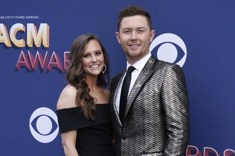 Gabi Dugal and Scotty McCreery pose on the red carpet as they arrive for the 53rd Academy Of Country Music Awards on Sunday, April 15, 2018, in Las Vegas. Gabi Dugal (McCreery) and Scotty McCreery