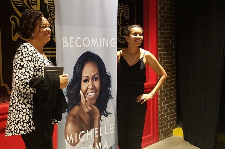 Along with plenty of merchandise for sale, there were also plenty of areas for event-goers to get a photo with Michelle Obama at no cost. Along with plenty of merchandise for sale, there were also plenty of areas for event-goers to get a photo with Michelle Obama at no cost.