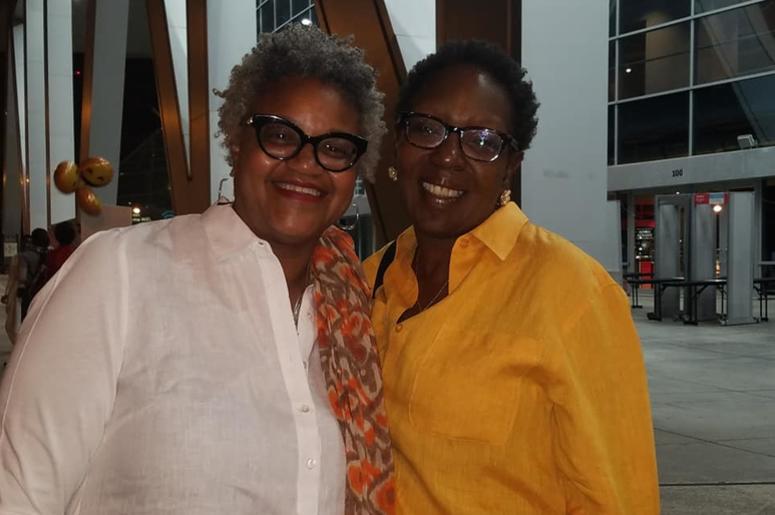 Donna Grant Dunn (l) took her sister Kimberly Grant (r) to the Michelle Obama event for Mother's Day. Donna Grant Dunn (l) took her sister Kimberly Grant (r) to the Michelle Obama event for Mother's Day.