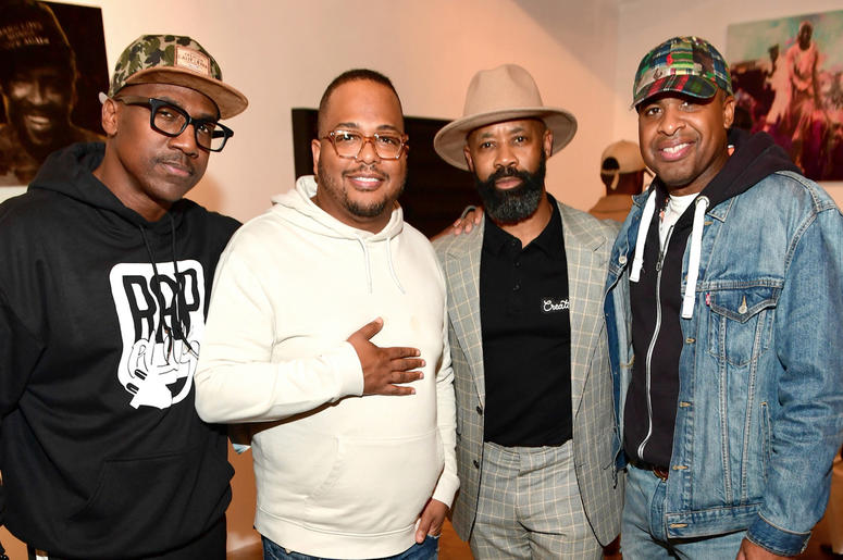 A group of attendees including ONE Musicfest founder Jay Carter attend Trap Music Museum curator D.L. Warfield's "My Favorite Things" art exhibit on November 30, 2018, in Atlanta. A group of attendees including ONE Musicfest founder Jay Carter attend Trap Music Museum curator D.L. Warfield's "My Favorite Things" art exhibit on November 30, 2018, in Atlanta.