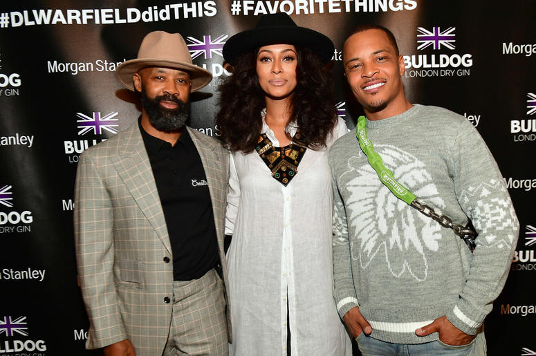 T.I., Keri Hilson, and Trap Music Museum curator D.L. Warfield at Warfield's "My Favorite Things" art exhibit on November 30, 2018, in Atlanta. T.I., Keri Hilson, and Trap Music Museum curator D.L. Warfield at Warfield's "My Favorite Things" art exhibit on November 30, 2018, in Atlanta.