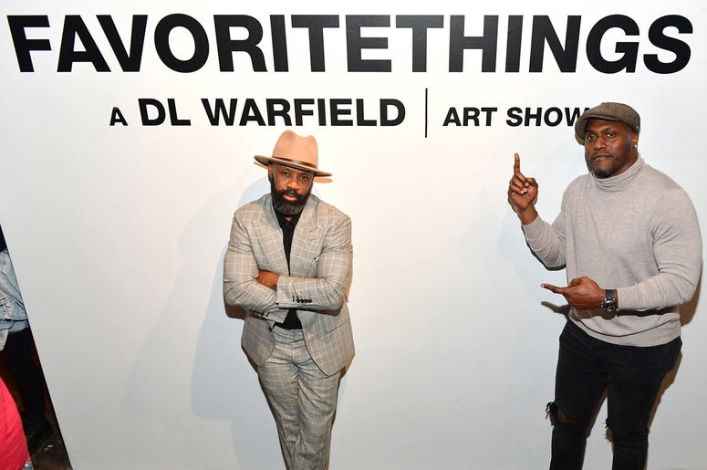 NFL Hall of Fame nominee Takeo Spikes hosted D.L. Warfield's "My Favorite Things" art exhibit on November 30, 2018, in Atlanta. NFL Hall of Fame nominee Takeo Spikes hosted D.L. Warfield's "My Favorite Things" art exhibit on November 30, 2018, in Atlanta.