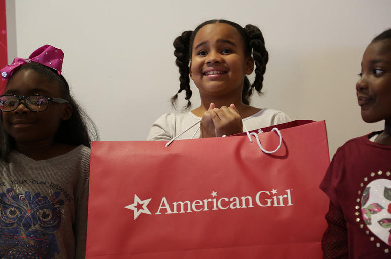 Girls receive American Girl dolls from V-103's Frank and Wanda In The Morning Girls receive American Girl dolls from V-103's Frank and Wanda In The Morning