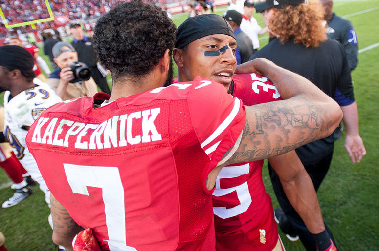Colin Kaepernick hugs Eric Reid Colin Kaepernick hugs Eric Reid