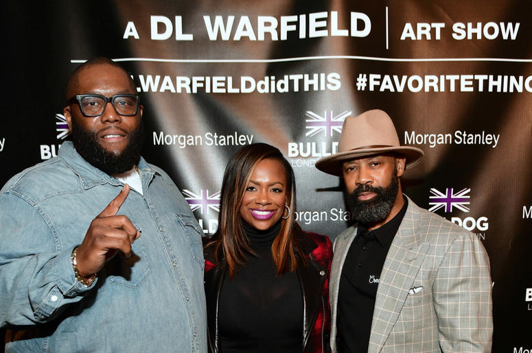 Killer Mike and Kandi Burrus pose with D.L. Warfield at his "My Favorite Things" Art Exhibit in Atlanta; November 30, 2018. Killer Mike and Kandi Burrus pose with D.L. Warfield at his "My Favorite Things" Art Exhibit in Atlanta; November 30, 2018.