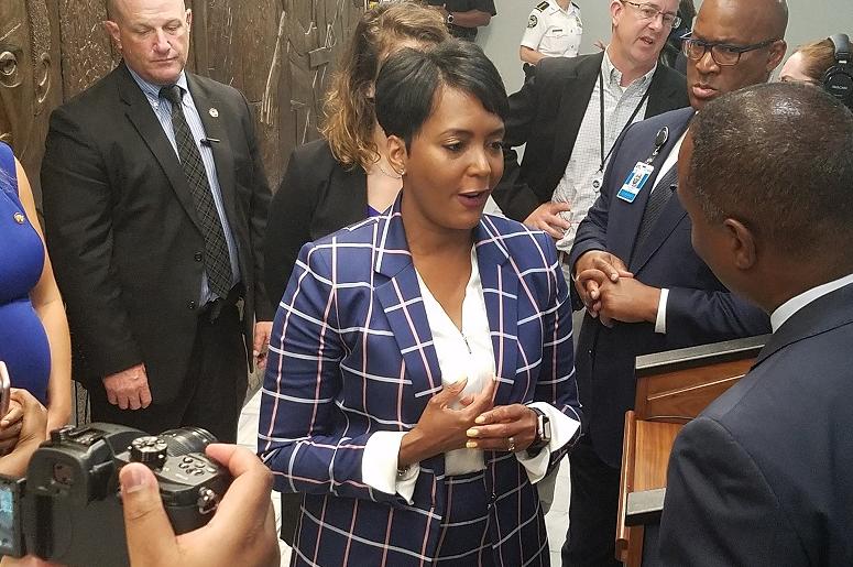 Atlanta Mayor Keisha Lance Bottoms speaks with reporters following Thursday news conference about her Executive Order on immigration