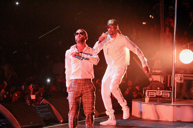 Snoop Dogg and Lil Duval perform at Atlanta's State Farm Arena during the Puff Puff Pass Tour Snoop Dogg and Lil Duval perform at Atlanta's State Farm Arena during the Puff Puff Pass Tour