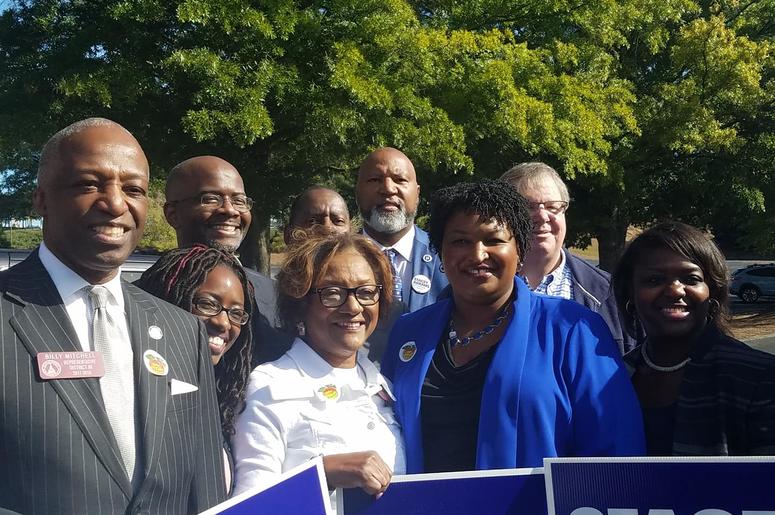 Democratic Gubernatorial Candidate Stacey Abrams is joined by politicians and other supporters after she cast her ballot Democratic Gubernatorial Candidate Stacey Abrams is joined by politicians and other supporters after she cast her ballot