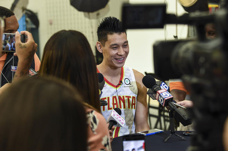 Atlanta Hawks player Jeremy Lin (7) is shown being interviewed during Hawks Media Day at the Emory Sports Medicine Complex.