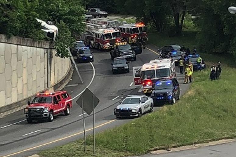 The apparently stolen vehicle dangles from a ledge in Atlanta