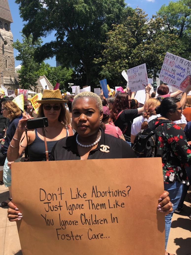 GA State Representative Erica Thomas, who is 7 months pregnant, addressed Tuesday's abortion ban protest at the GA Capitol GA State Representative Erica Thomas, who is 7 months pregnant, addressed Tuesday's abortion ban protest at the GA Capitol