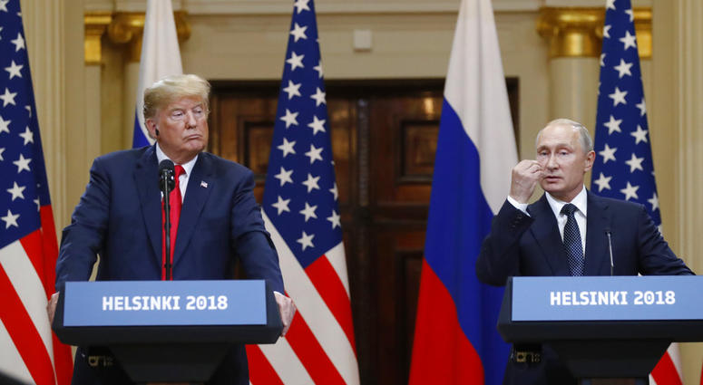 Trump and Putin AP Trump and Putin AP