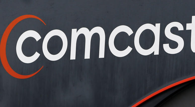 Comcast & Fox - AP Comcast & Fox - AP