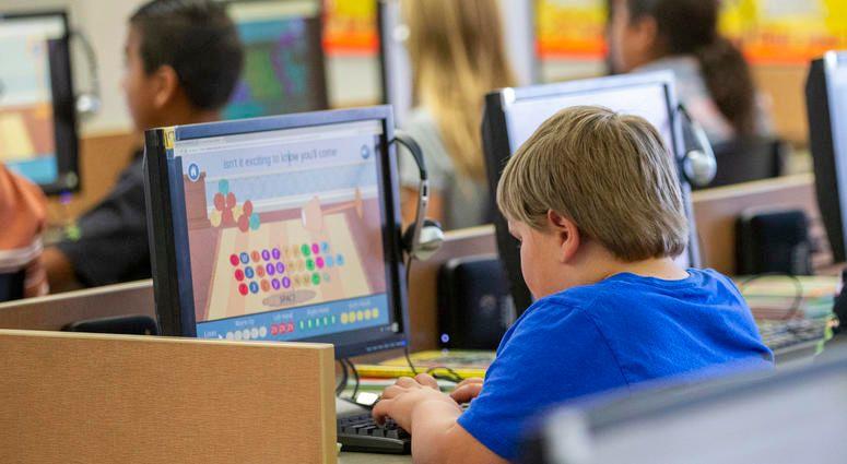 kid on a computer kid on a computer