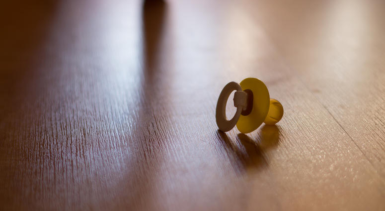 pacifier on floor pacifier on floor