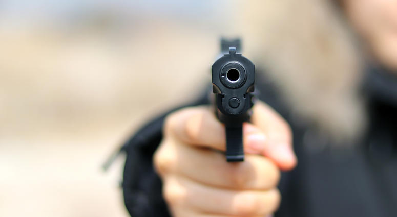 police officer pointing gun police officer pointing gun