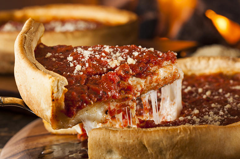Slice of Chicago deep dish pizza. Slice of Chicago deep dish pizza.