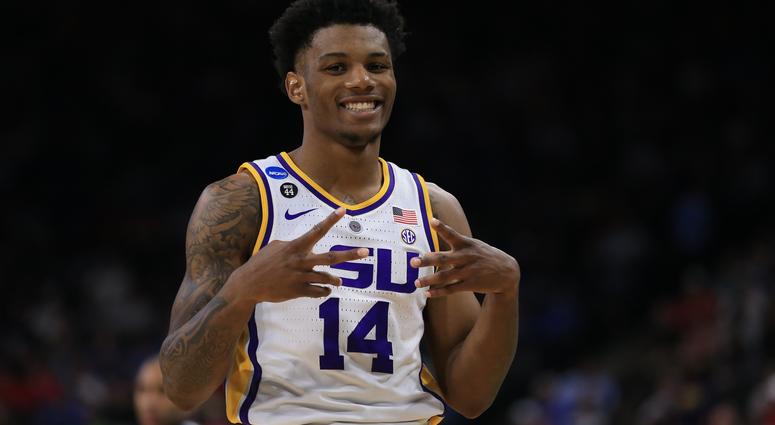LSU's Skylar Mays (4) goes up for a shot over Yale 's Paul Atkinson (20) and Jordan Bruner (23) during the first half of a first round men's college basketball game in the NCAA Tournament in Jacksonville, Fla., Thursday, March 21, 2019. (AP Photo/John Rao LSU's Skylar Mays (4) goes up for a shot over Yale 's Paul Atkinson (20) and Jordan Bruner (23) during the first half of a first round men's college basketball game in the NCAA Tournament in Jacksonville, Fla., Thursday, March 21, 2019. (AP Photo/John Rao