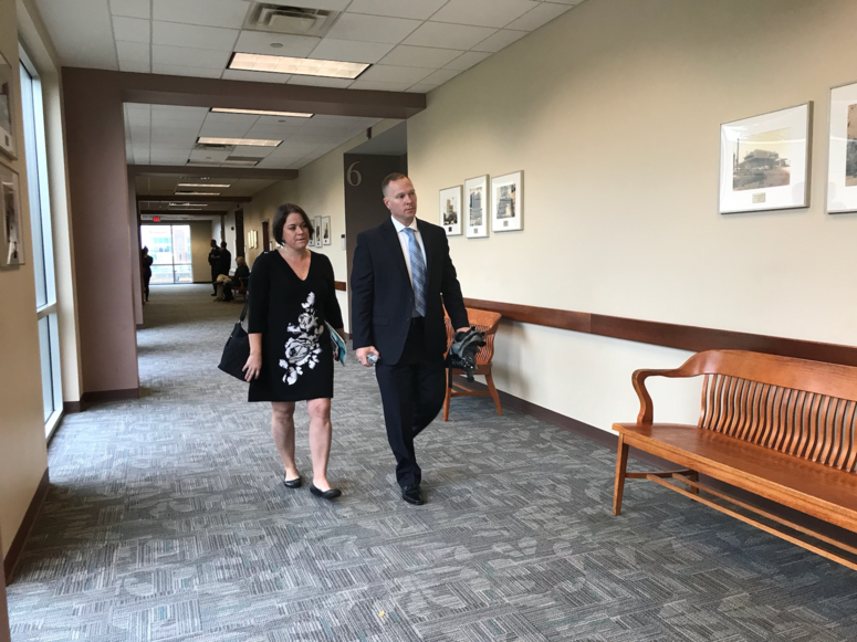 Day 2 of Trial for Suspended Sheriff Will Lewis; Wife Amy Lewis walks beside