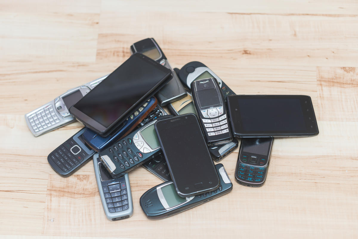 pile of old cellphones pile of old cellphones