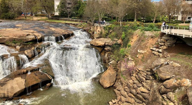 The Reedy River runs through downtown Greenville The Reedy River runs through downtown Greenville