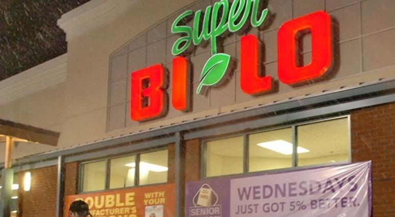 Sanding the parking lot at the Bi-Lo on Woodruff Road after snow storm. BI-LO on Woodruff Road