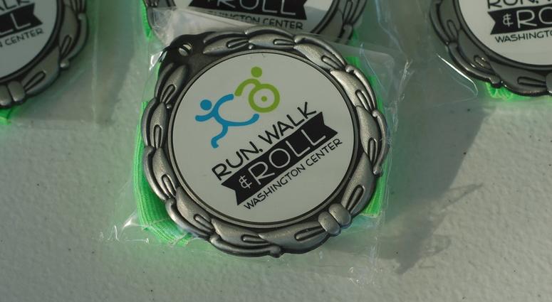 Washington Center School raises money with Run, Walk & Roll Washington Center Run Walk & Roll medals