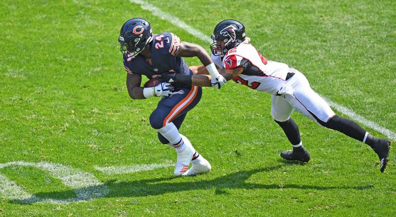 Atlanta Falcons outside linebacker Duke Riley (42) attempts to tackle Chicago Bears running back Jordan Howard (24) during a game at Soldier Field